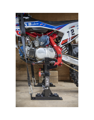 Système d'arrimage à verrouillage rapide pour vélo de motocross